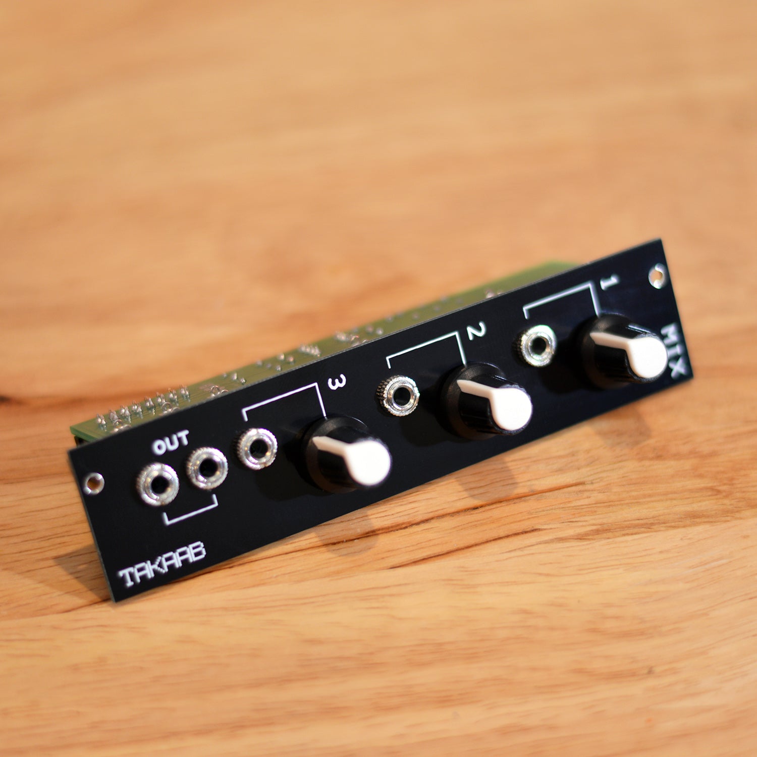 Takaab MIX v1 - 3 Channel Mixer Eurorack Synthesizer Module - Top angled view